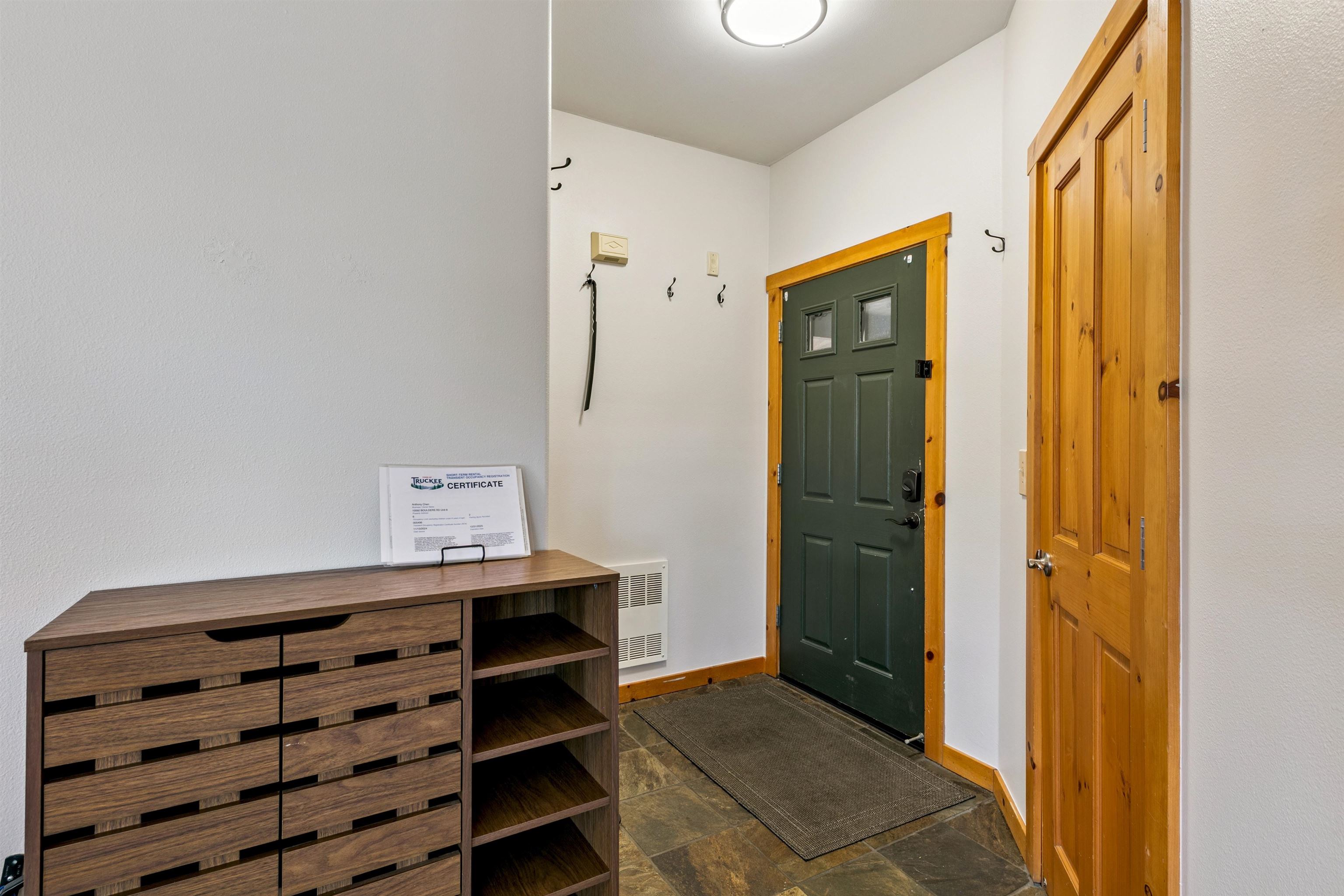 10592 Boulders Road, Unit 8 Truckee, CA 96161 - Photo 3 of 28 a view of room with cabinets and wooden floor