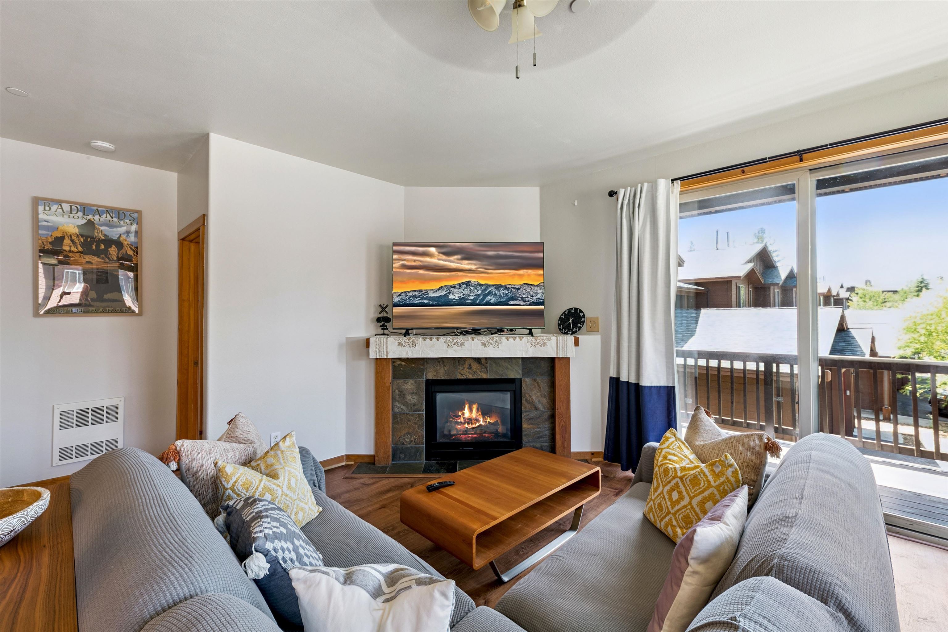 10592 Boulders Road, Unit 8 Truckee, CA 96161 - Photo 6 of 28 a living room with furniture and a fireplace