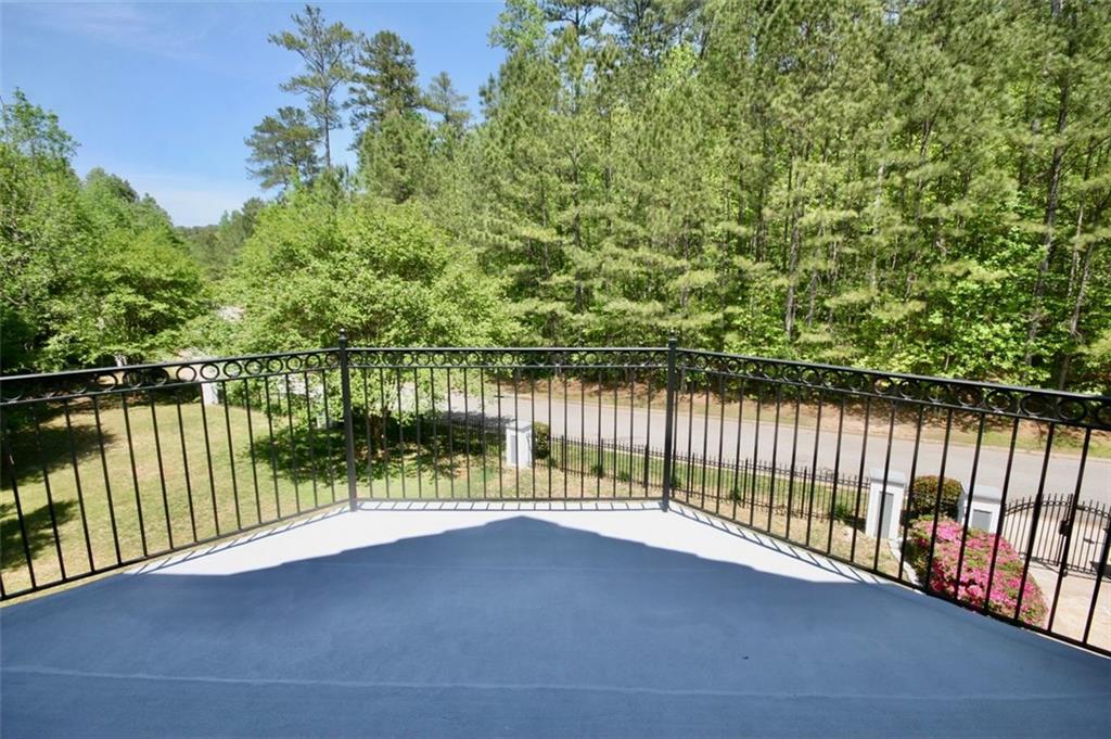 6509 Lily Trail Fairburn, GA 30213 - Photo 104 of 117 a view of balcony with outdoor space and lake view