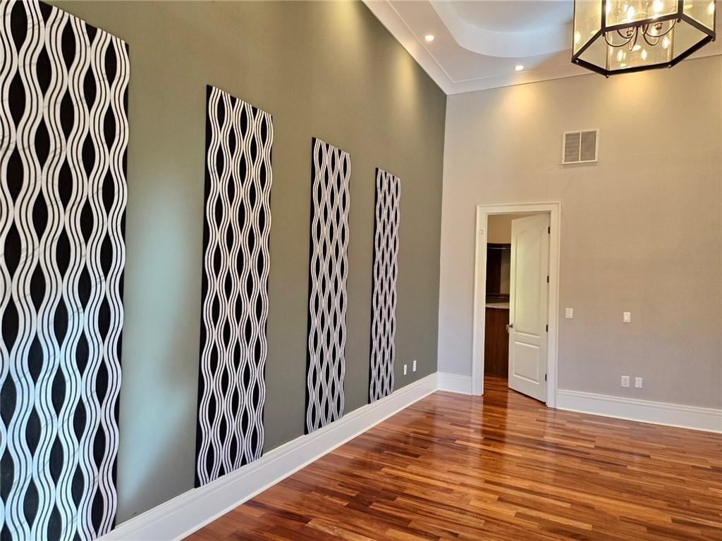 6509 Lily Trail Fairburn, GA 30213 - Photo 27 of 117 a view of a room with wooden floor and windows