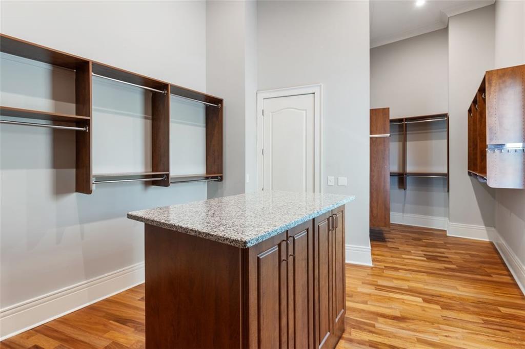 6509 Lily Trail Fairburn, GA 30213 - Photo 36 of 117 a kitchen with stainless steel appliances granite countertop a refrigerator and a sink