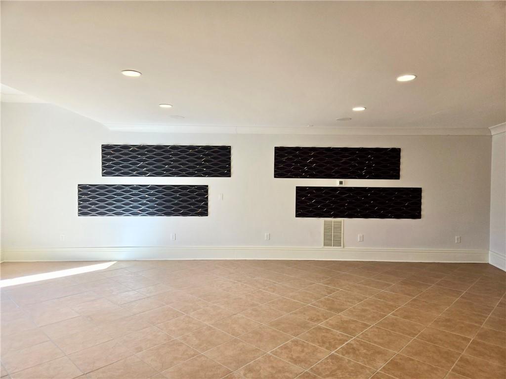 6509 Lily Trail Fairburn, GA 30213 - Photo 45 of 117 a view of an empty room with wooden floor