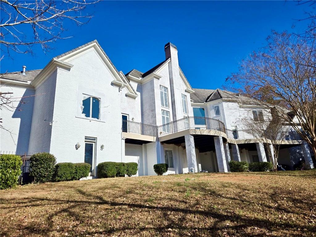 6509 Lily Trail Fairburn, GA 30213 - Photo 74 of 117 a view of a white building with large windows