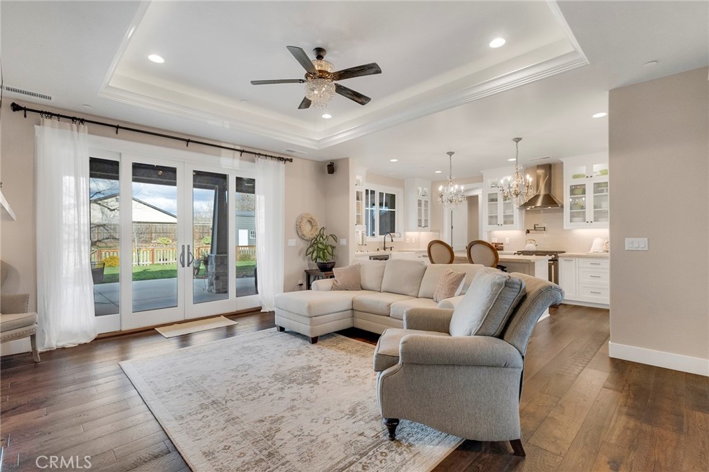 3424 Hackamore Lane Chico, CA 95973 - Photo 11 of 67 a living room with furniture and a large window with wooden floor