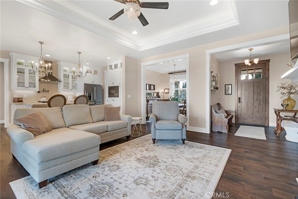 3424 Hackamore Lane Chico, CA 95973 - Photo 13 of 67 a living room with furniture wooden floor and a chandelier
