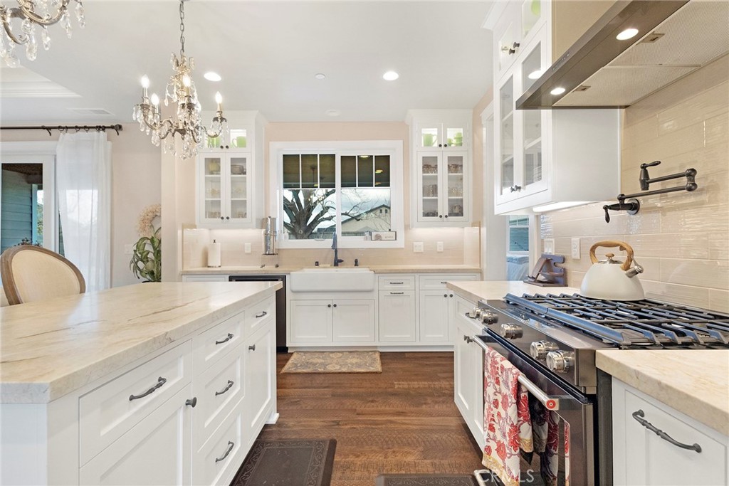 3424 Hackamore Lane Chico, CA 95973 - Photo 19 of 67 a kitchen with a sink stove and cabinets