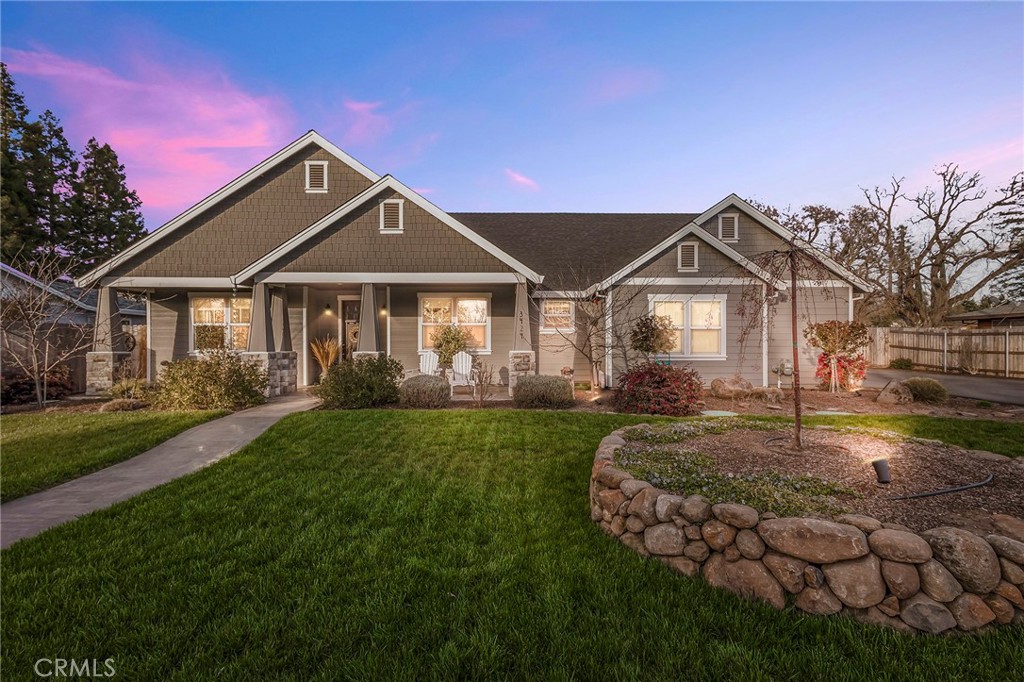 3424 Hackamore Lane Chico, CA 95973 - Photo 2 of 67 a front view of a house with a yard