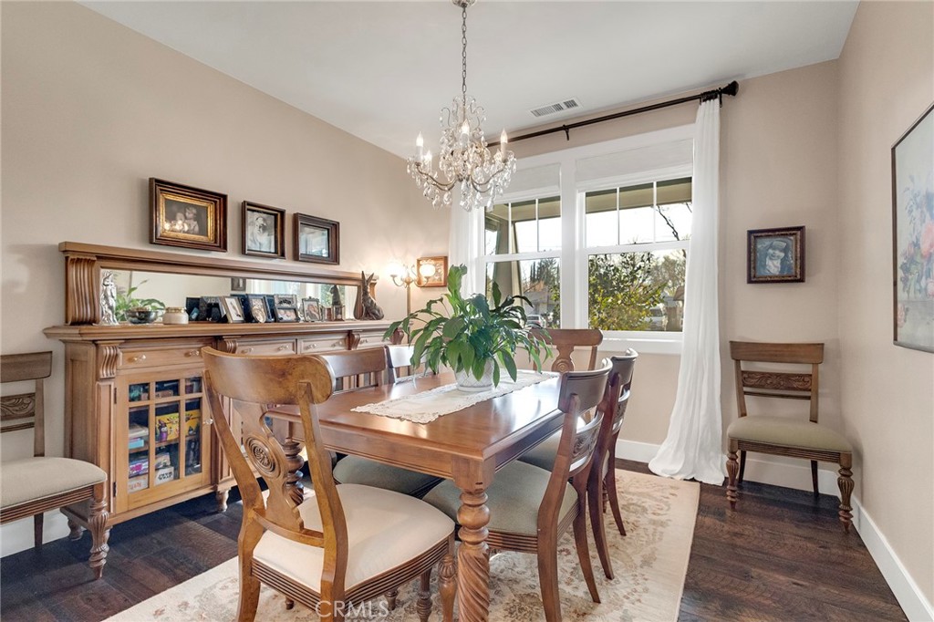 3424 Hackamore Lane Chico, CA 95973 - Photo 26 of 67 a view of a dining room with furniture window and wooden floor