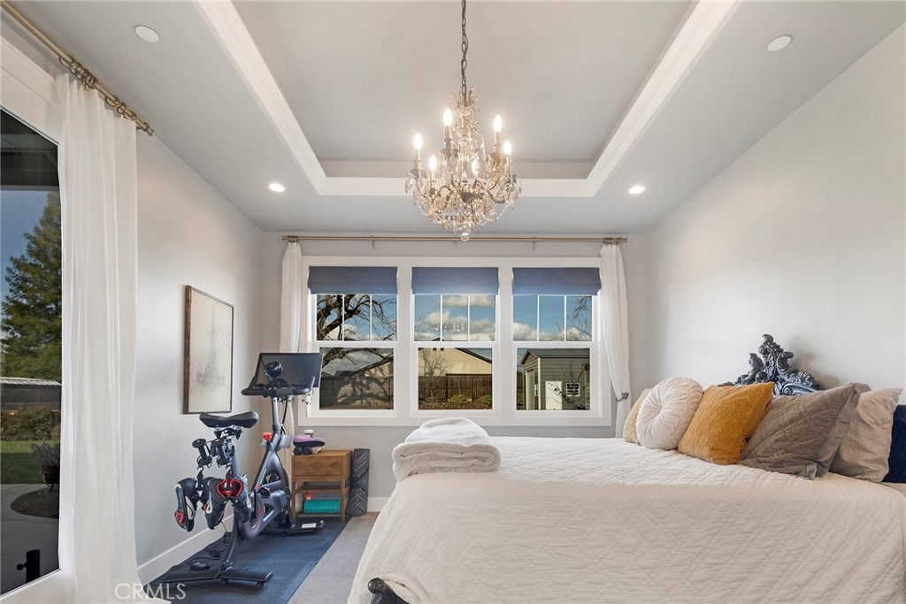 3424 Hackamore Lane Chico, CA 95973 - Photo 28 of 67 a bedroom with bed and windows