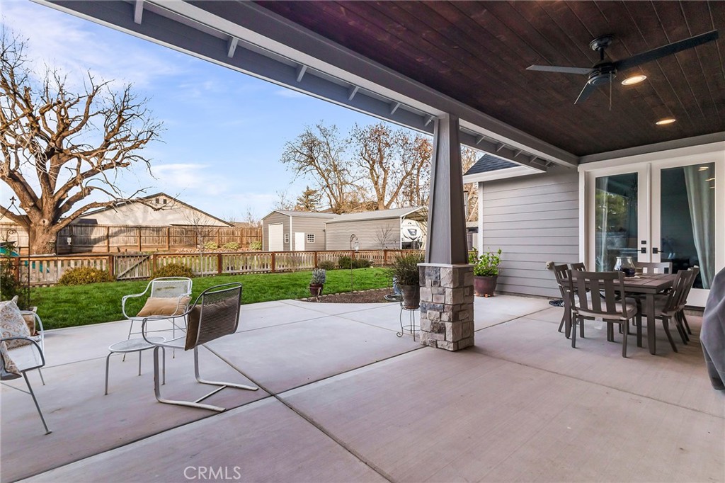 3424 Hackamore Lane Chico, CA 95973 - Photo 51 of 67 a patio with a table and chairs