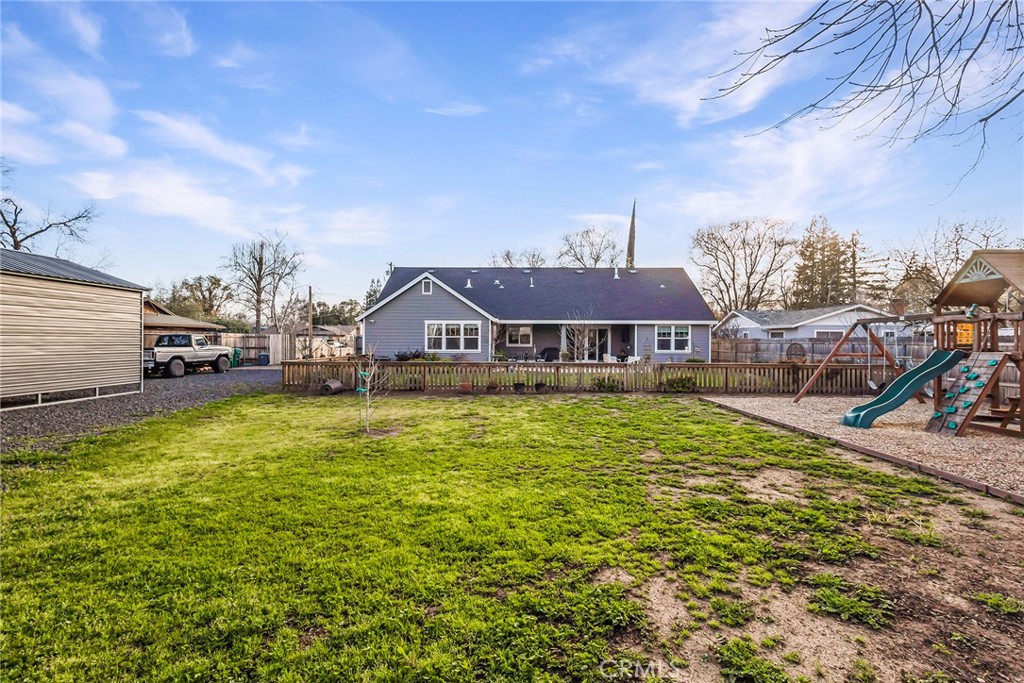 3424 Hackamore Lane Chico, CA 95973 - Photo 54 of 67 a front view of a house with swimming pool