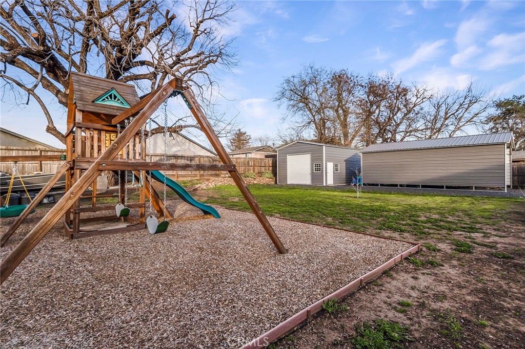 3424 Hackamore Lane Chico, CA 95973 - Photo 57 of 67 a view of a house with a yard