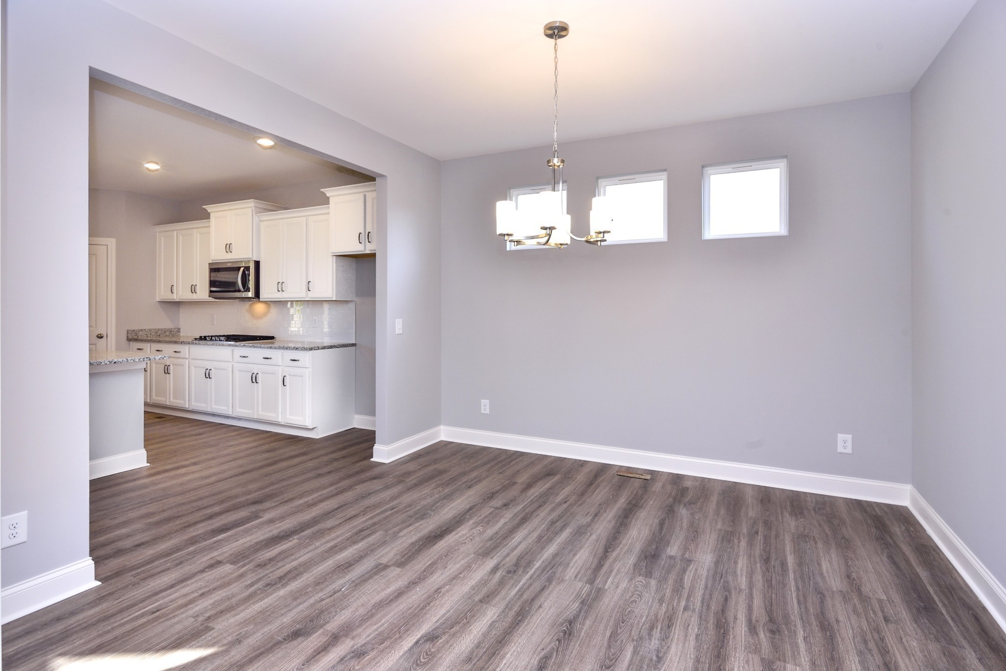 74 Remington Road Lebanon, TN 37090 - Photo 7 of 25 a view of a kitchen with stove and cabinets