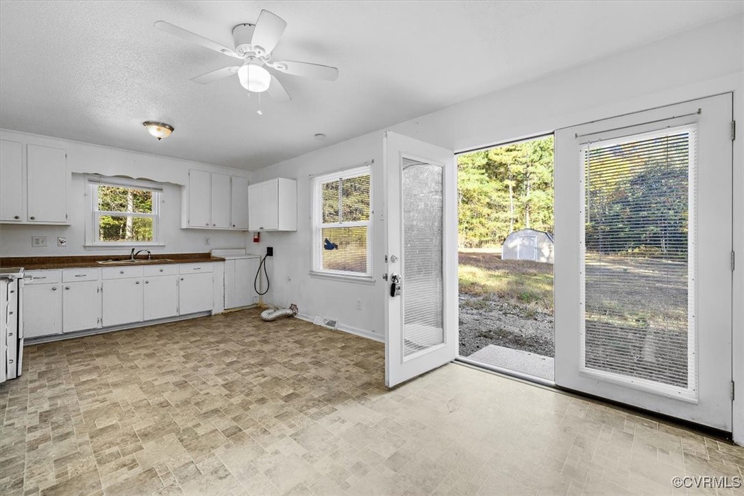21814 Carson Road Dinwiddie, VA 23841 - Photo 12 of 24 a view of a kitchen with a sink and a window