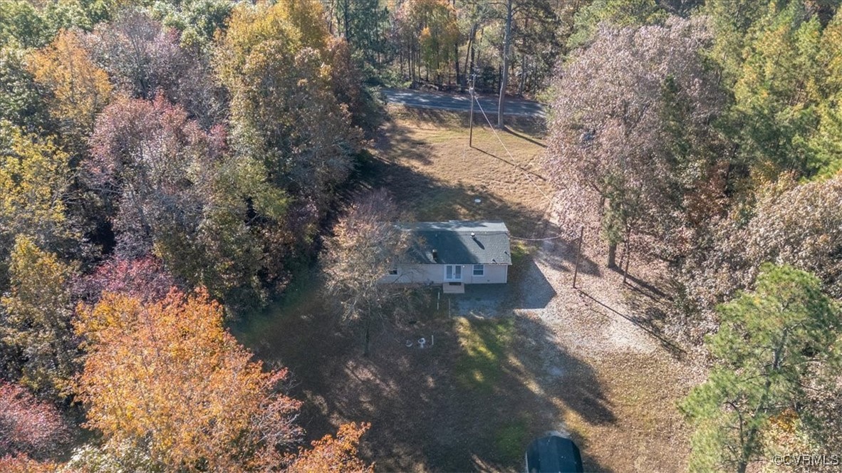 21814 Carson Road Dinwiddie, VA 23841 - Photo 2 of 24 a view of a yard with a tree