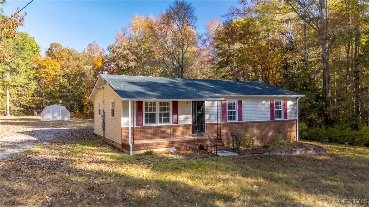 21814 Carson Road Dinwiddie, VA 23841 - Photo 3 of 24 a view of a house with a yard