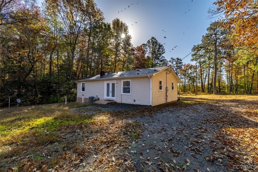 21814 Carson Road Dinwiddie, VA 23841 - Photo 6 of 24 a view of a yard with large trees
