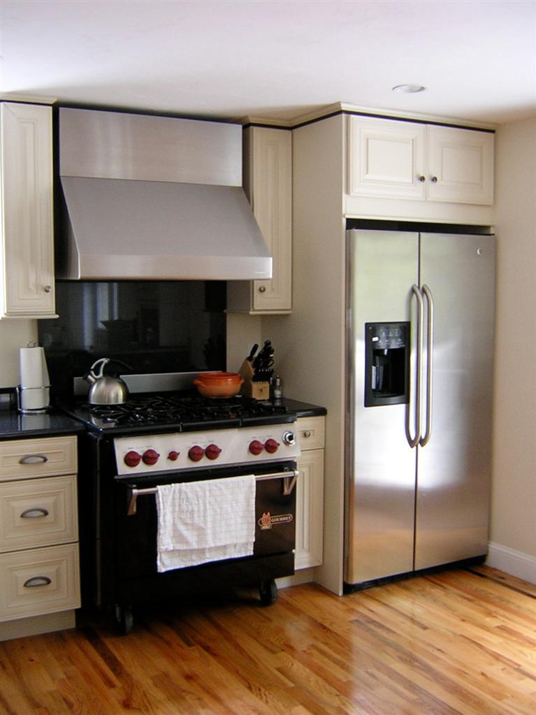 129 Summersea Road Mashpee, MA 02649 - Photo 3 of 6 a kitchen with stainless steel appliances granite countertop a stove and a refrigerator