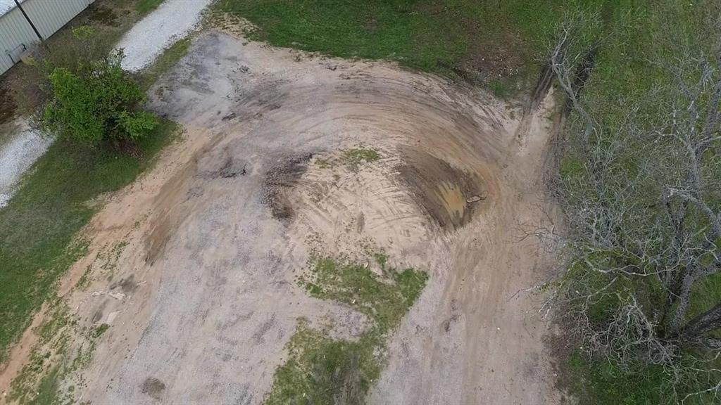 3110 West Gentry Parkway Tyler, TX 75702 - Photo 14 of 34 a view of a dry yard with trees
