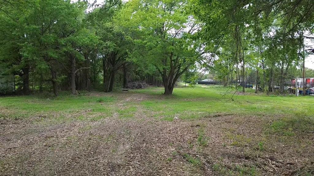 3110 West Gentry Parkway Tyler, TX 75702 - Photo 24 of 34 a view of a park with large trees