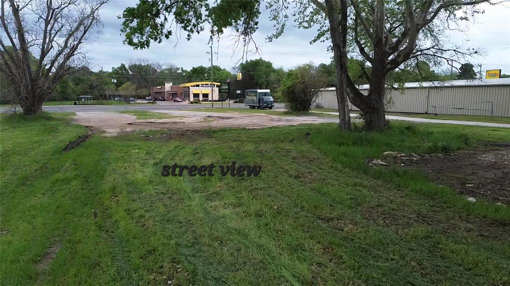 3110 West Gentry Parkway Tyler, TX 75702 - Photo 4 of 34 a view of a park with large trees