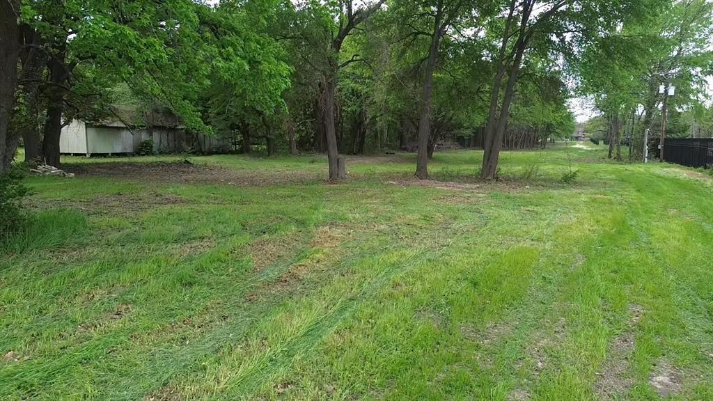 3110 West Gentry Parkway Tyler, TX 75702 - Photo 7 of 34 a view of a park with a tree
