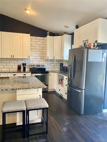 $475,000 | 714 School House Drive, Milliken, CO 80543