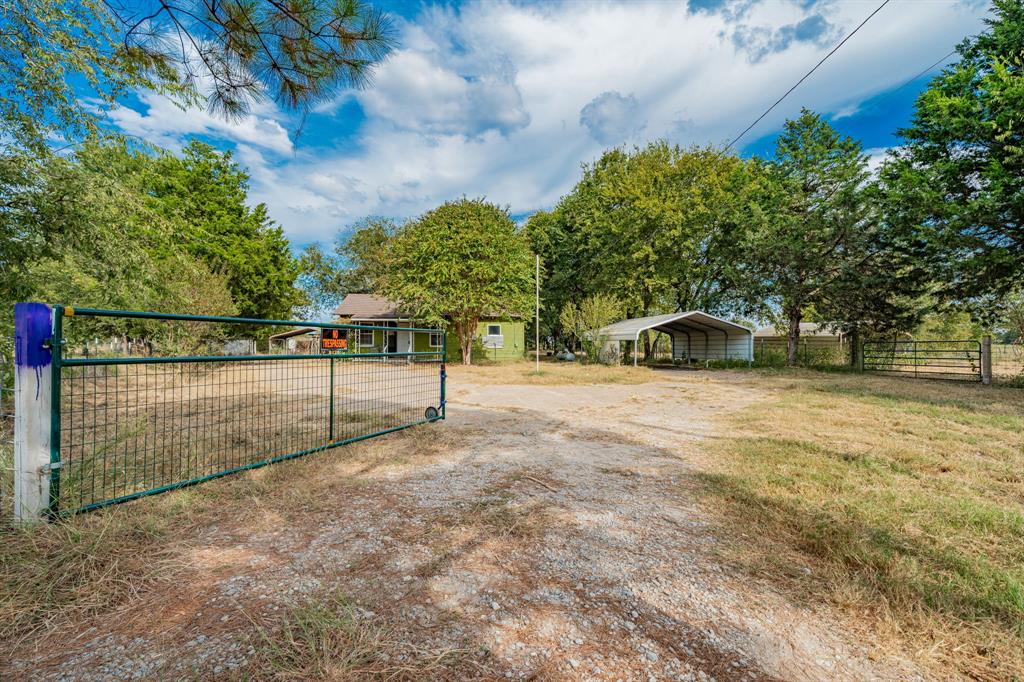 113 South Spikes Road Corsicana, TX 75110 - Photo 3 of 19 a view of street and yard