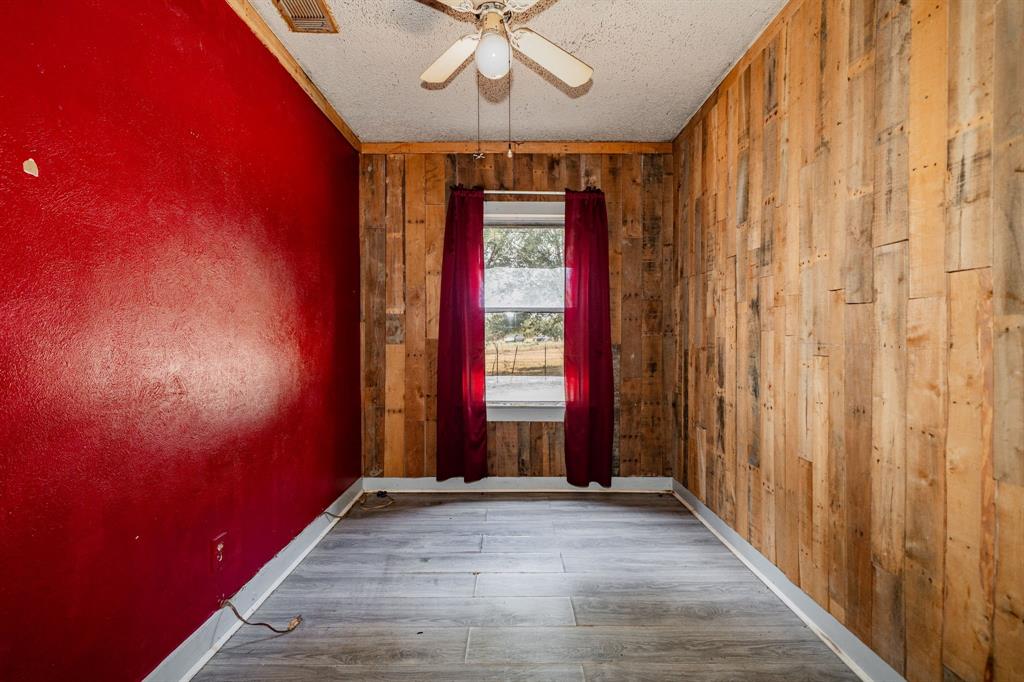 113 South Spikes Road Corsicana, TX 75110 - Photo 8 of 19 a view of room with window and stairs