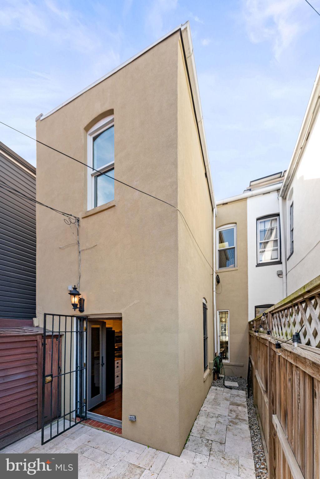 1218 G Street Southeast Washington, DC 20003 - Photo 16 of 37 a view of a porch with wooden floor and fence