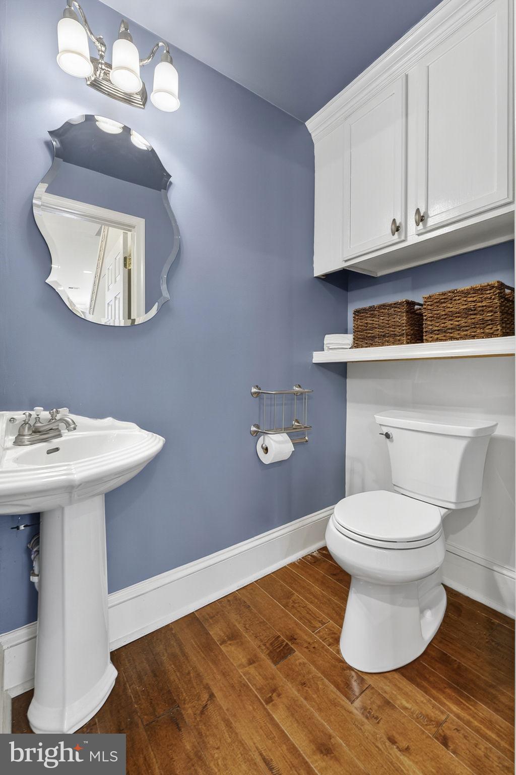 1218 G Street Southeast Washington, DC 20003 - Photo 20 of 37 a bathroom with a sink toilet and mirror