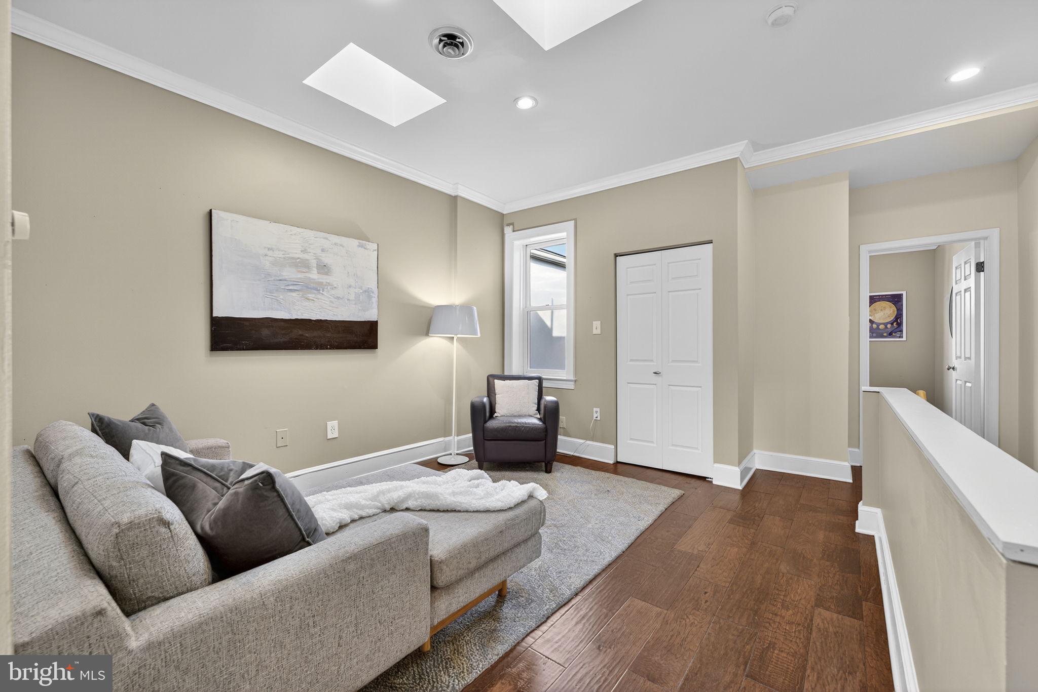 1218 G Street Southeast Washington, DC 20003 - Photo 22 of 37 a living room with furniture and a couch