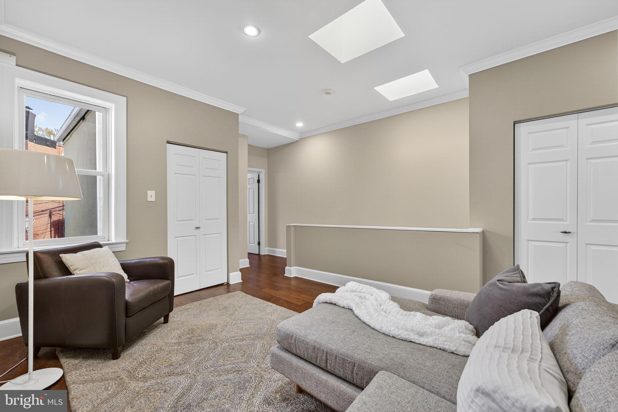 1218 G Street Southeast Washington, DC 20003 - Photo 24 of 37 a living room with furniture and a couch