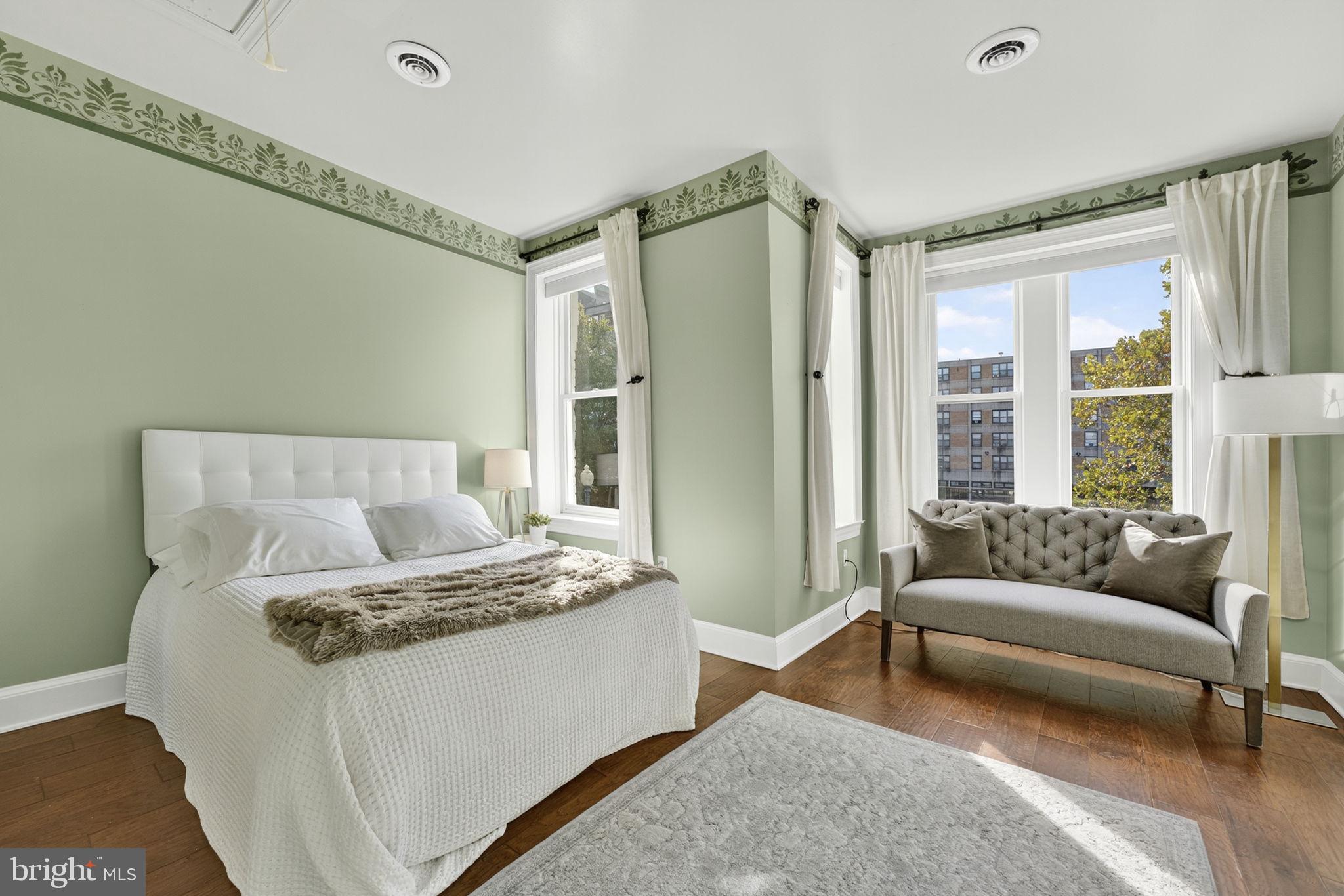 1218 G Street Southeast Washington, DC 20003 - Photo 26 of 37 a living room with furniture and a large window