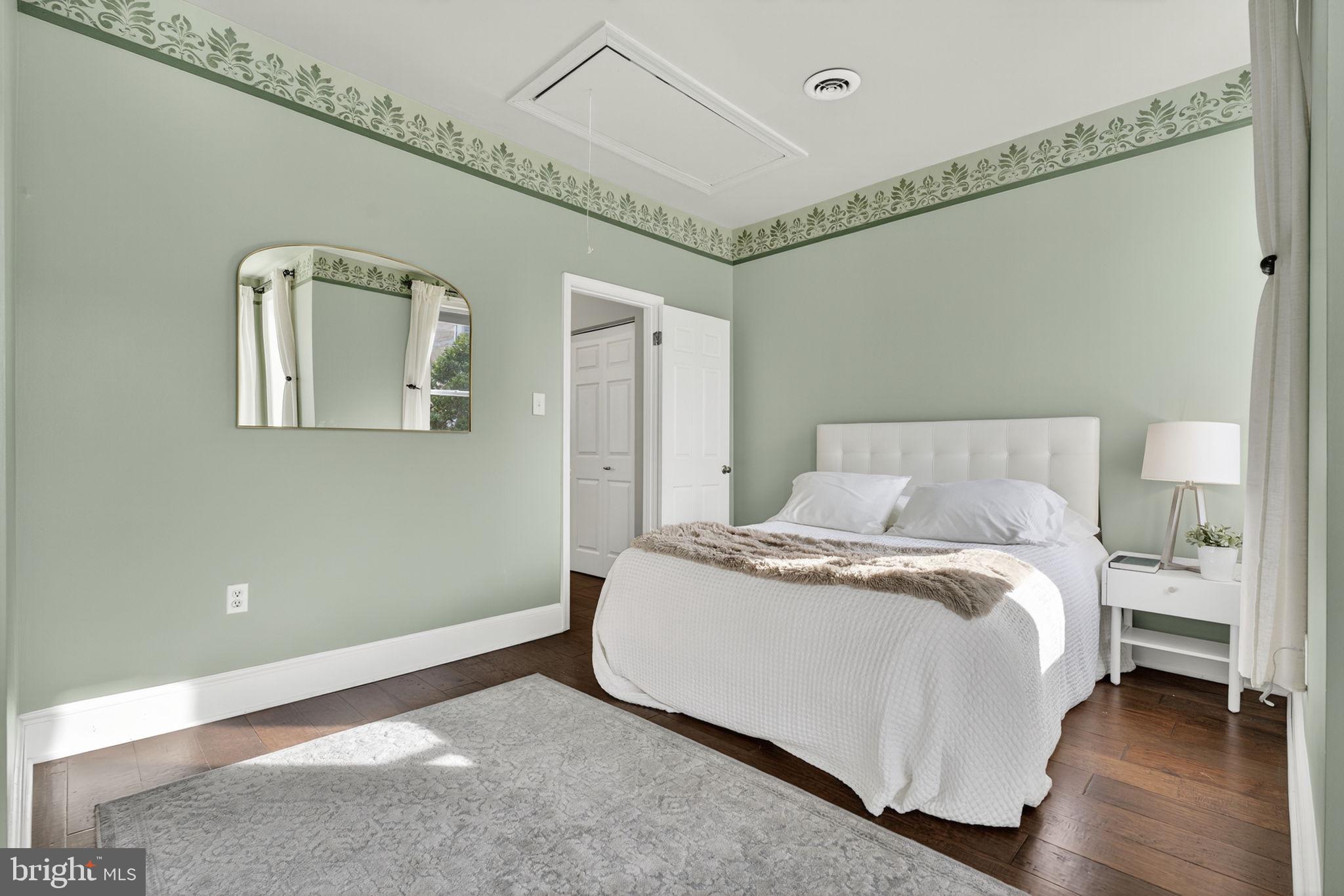 1218 G Street Southeast Washington, DC 20003 - Photo 28 of 37 a large white bed in a white room