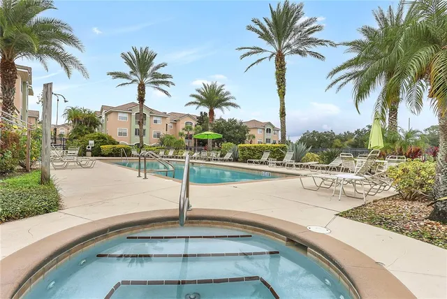 a view of a terrace with palm trees