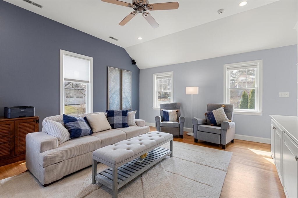 56 Grapevine Avenue Lexington, MA 02421 - Photo 21 of 38 a living room with furniture and a large window