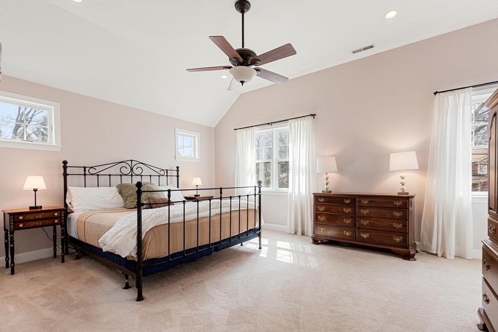 56 Grapevine Avenue Lexington, MA 02421 - Photo 24 of 38 a bedroom with a bed and a ceiling fan