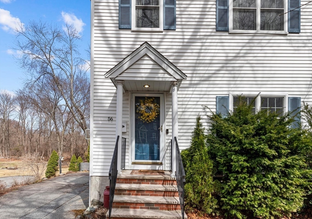 56 Grapevine Avenue Lexington, MA 02421 - Photo 3 of 38 a front view of a house with a yard