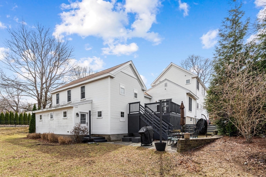 56 Grapevine Avenue Lexington, MA 02421 - Photo 31 of 38 a view of a car park in front of house