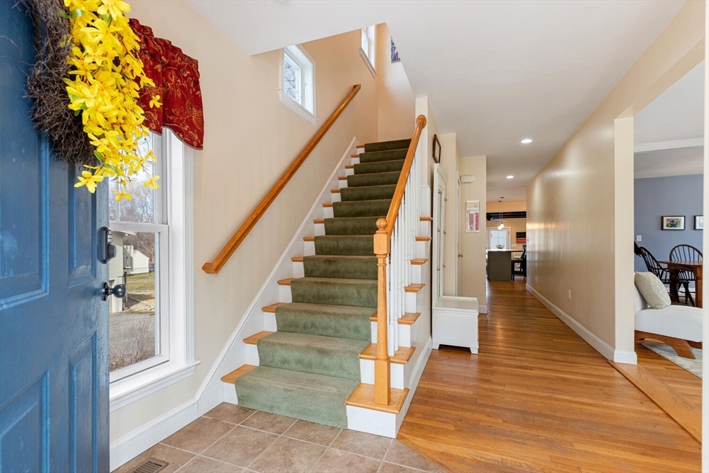56 Grapevine Avenue Lexington, MA 02421 - Photo 5 of 38 a view of entryway and hall with wooden floor
