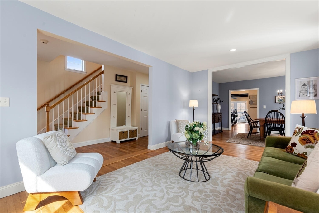 56 Grapevine Avenue Lexington, MA 02421 - Photo 9 of 38 a living room with furniture potted plant and couches