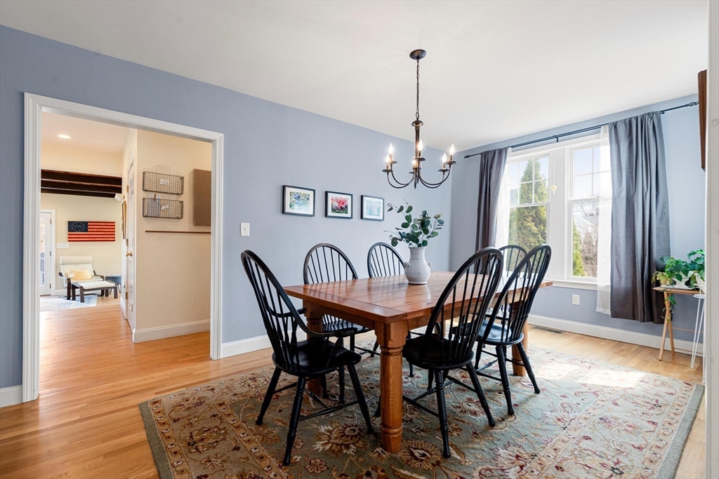 56 Grapevine Avenue Lexington, MA 02421 - Photo 10 of 38 a view of a dining room with furniture window and wooden floor