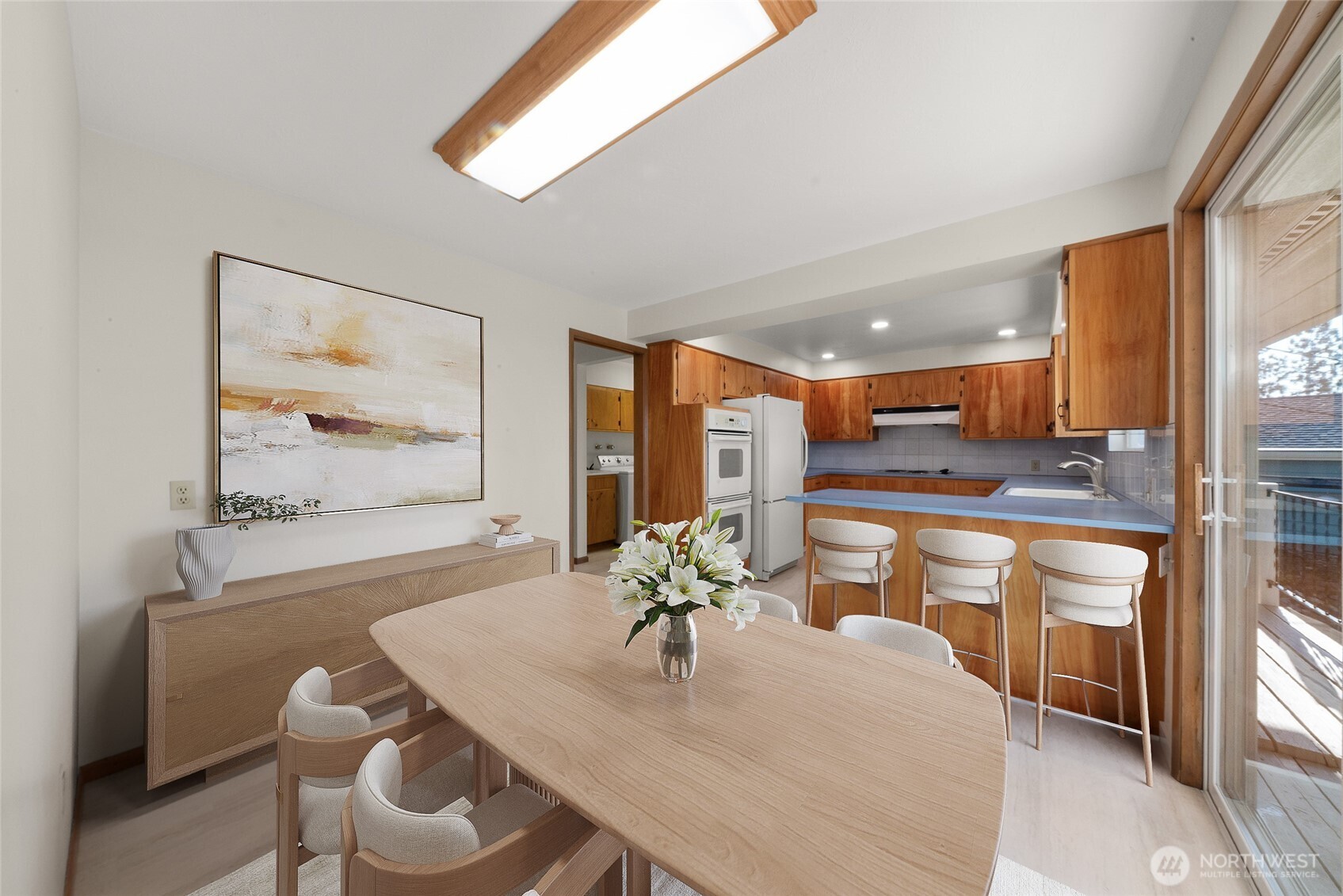 2811 West Weile Avenue Spokane, WA 99208 - Photo 11 of 39 a dining room with large window
