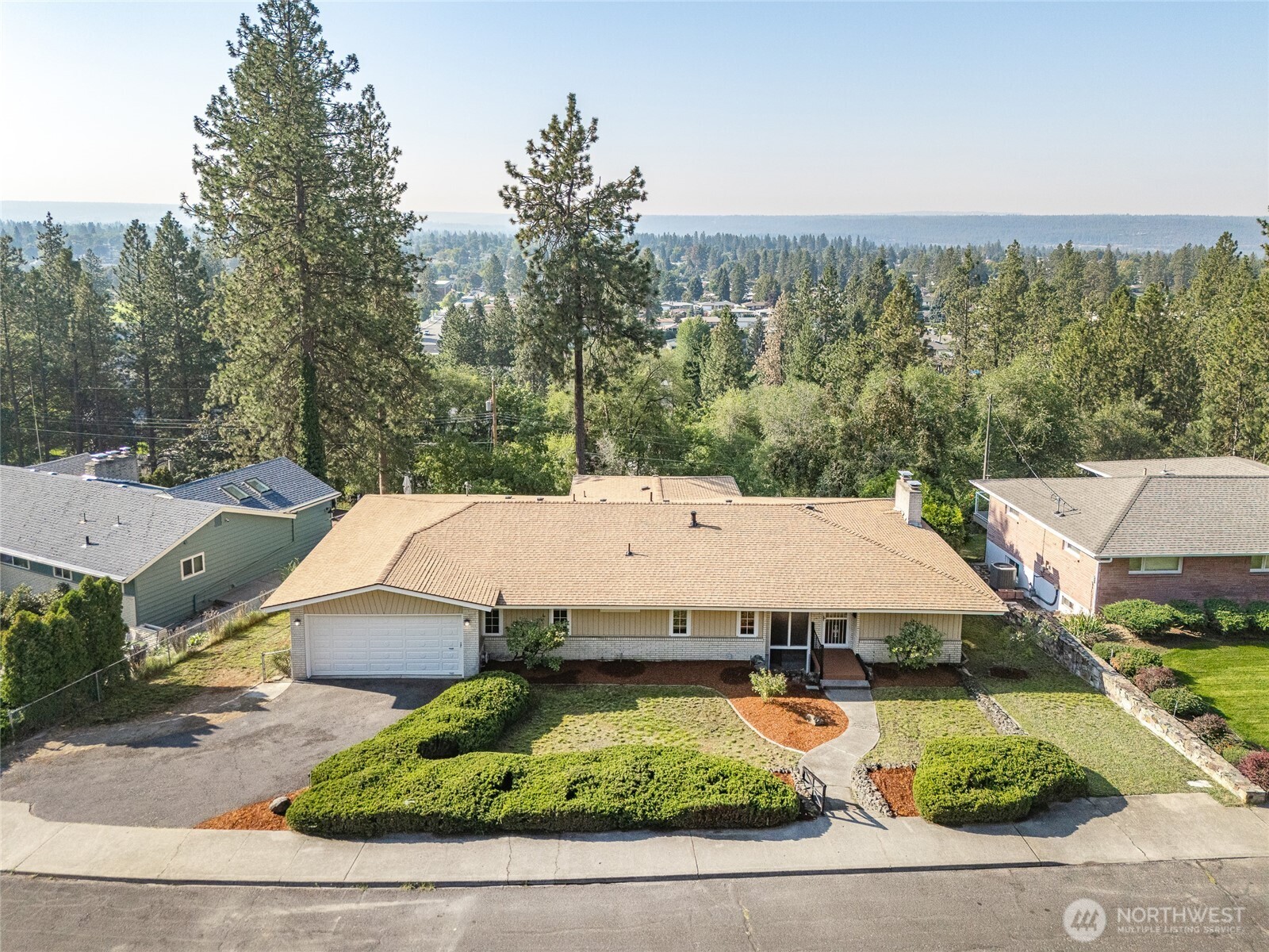 2811 West Weile Avenue Spokane, WA 99208 - Photo 2 of 39 an aerial view of a house with yard