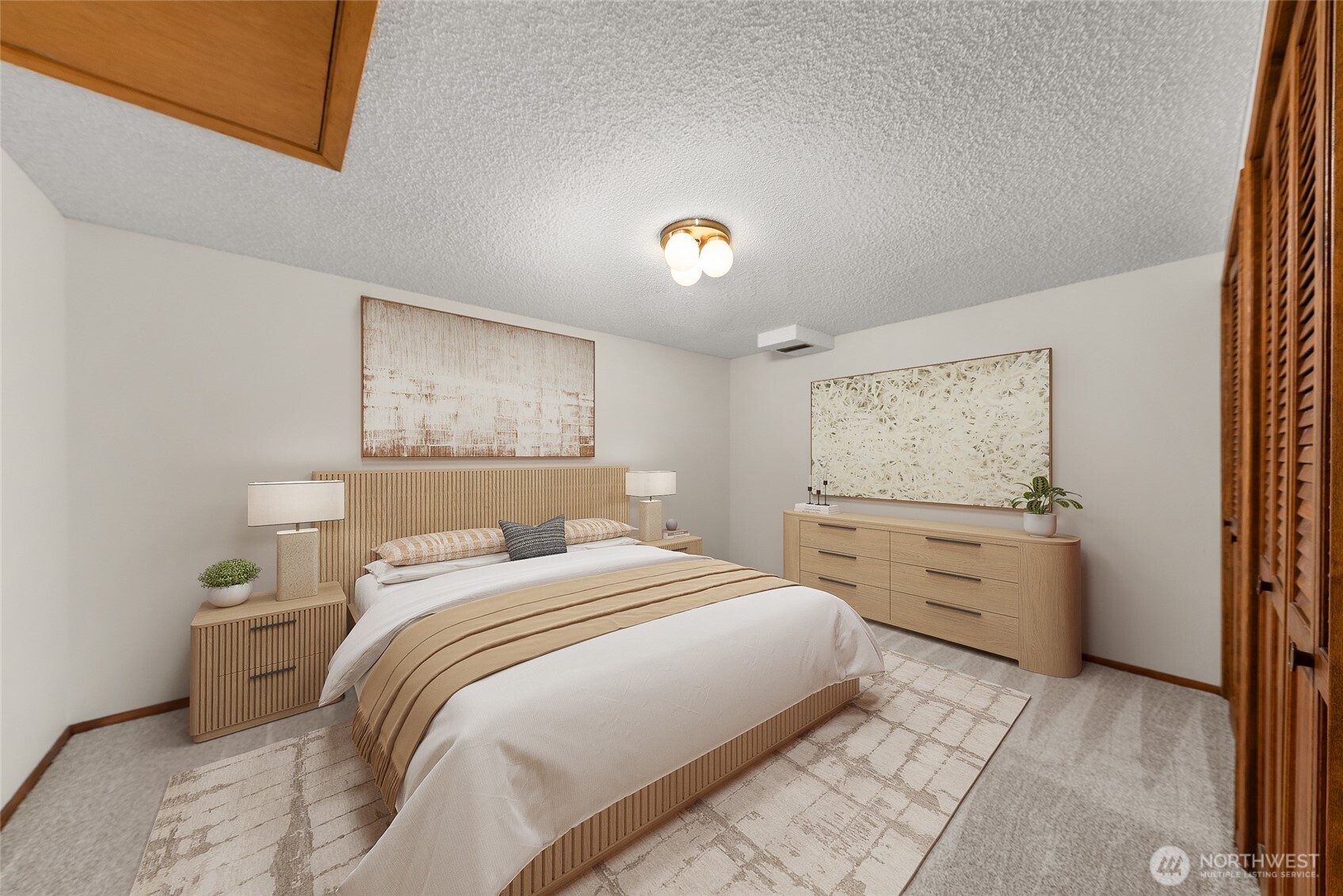 2811 West Weile Avenue Spokane, WA 99208 - Photo 25 of 39 a bedroom with a bed and a chandelier