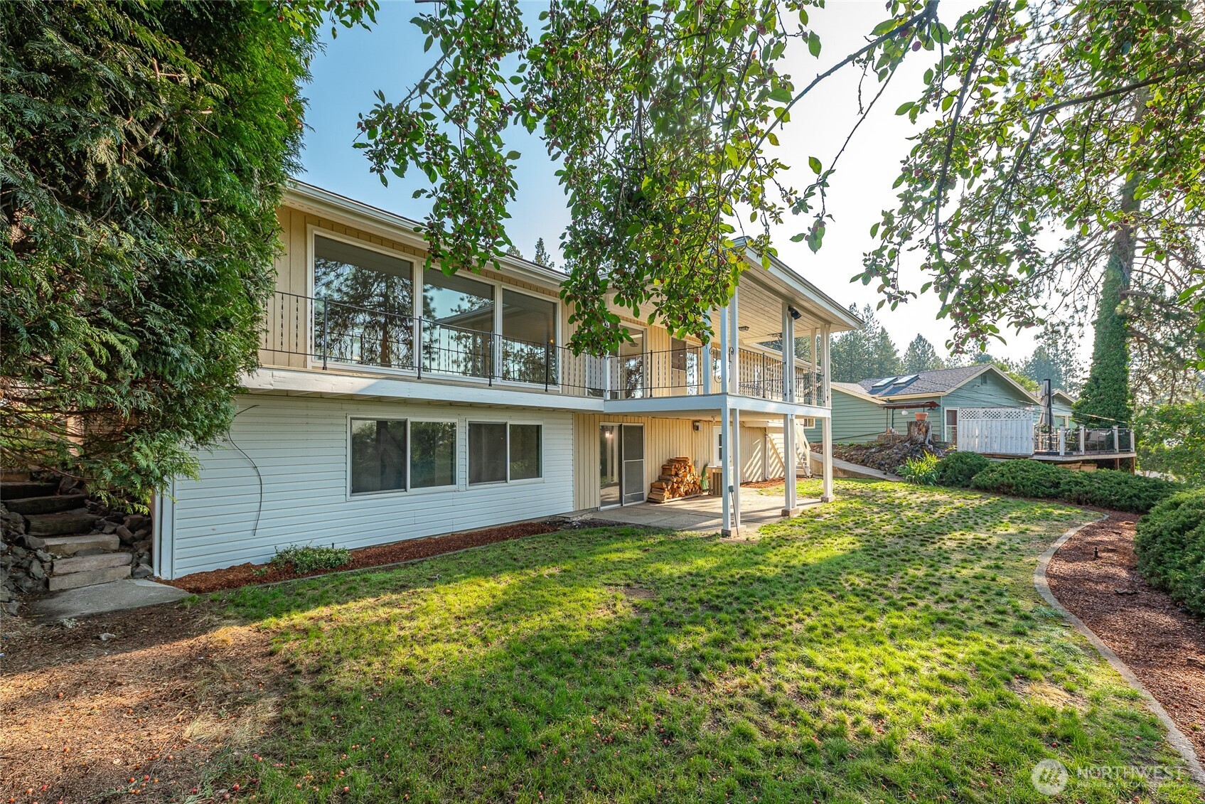 2811 West Weile Avenue Spokane, WA 99208 - Photo 32 of 39 front view of a house with a yard