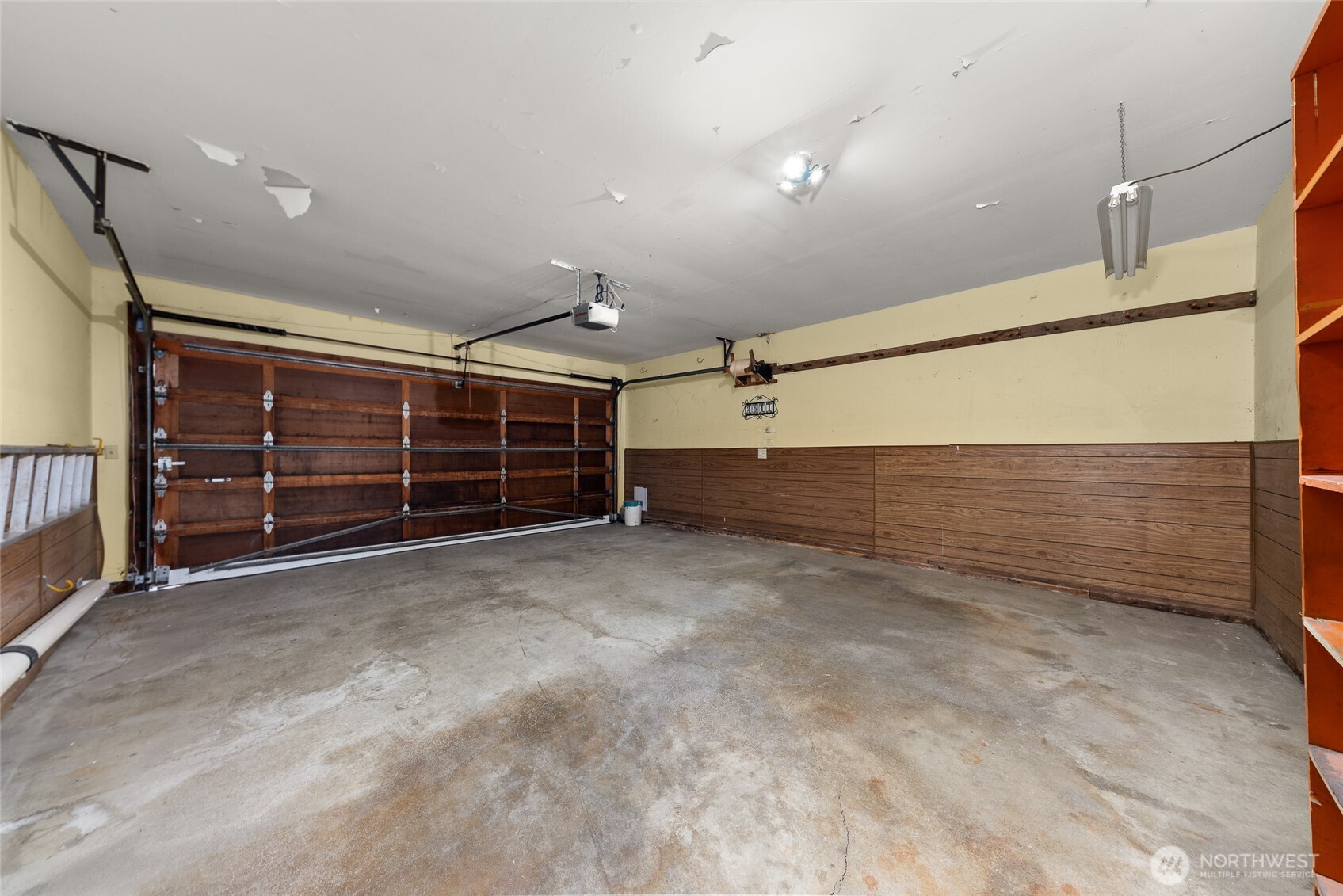 2811 West Weile Avenue Spokane, WA 99208 - Photo 38 of 39 a view of an empty room with furniture and staircase