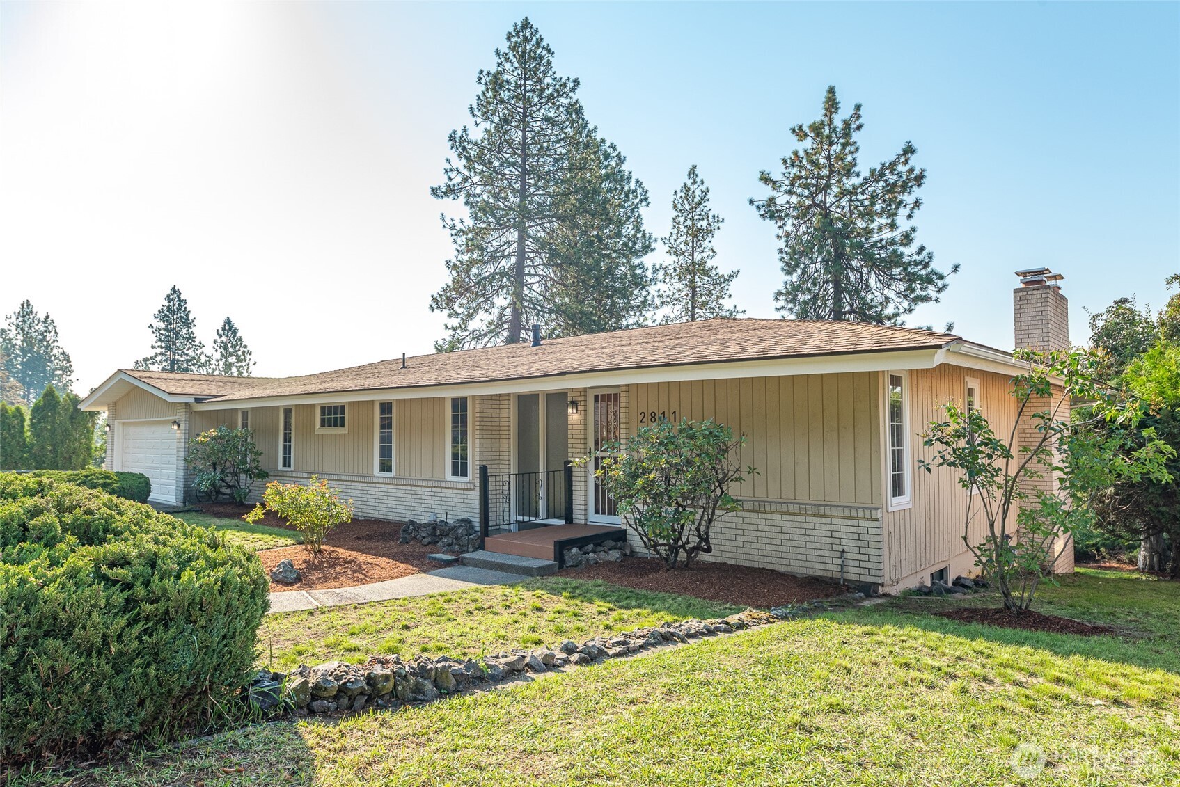 2811 West Weile Avenue Spokane, WA 99208 - Photo 39 of 39 a view of a house with backyard and sitting area