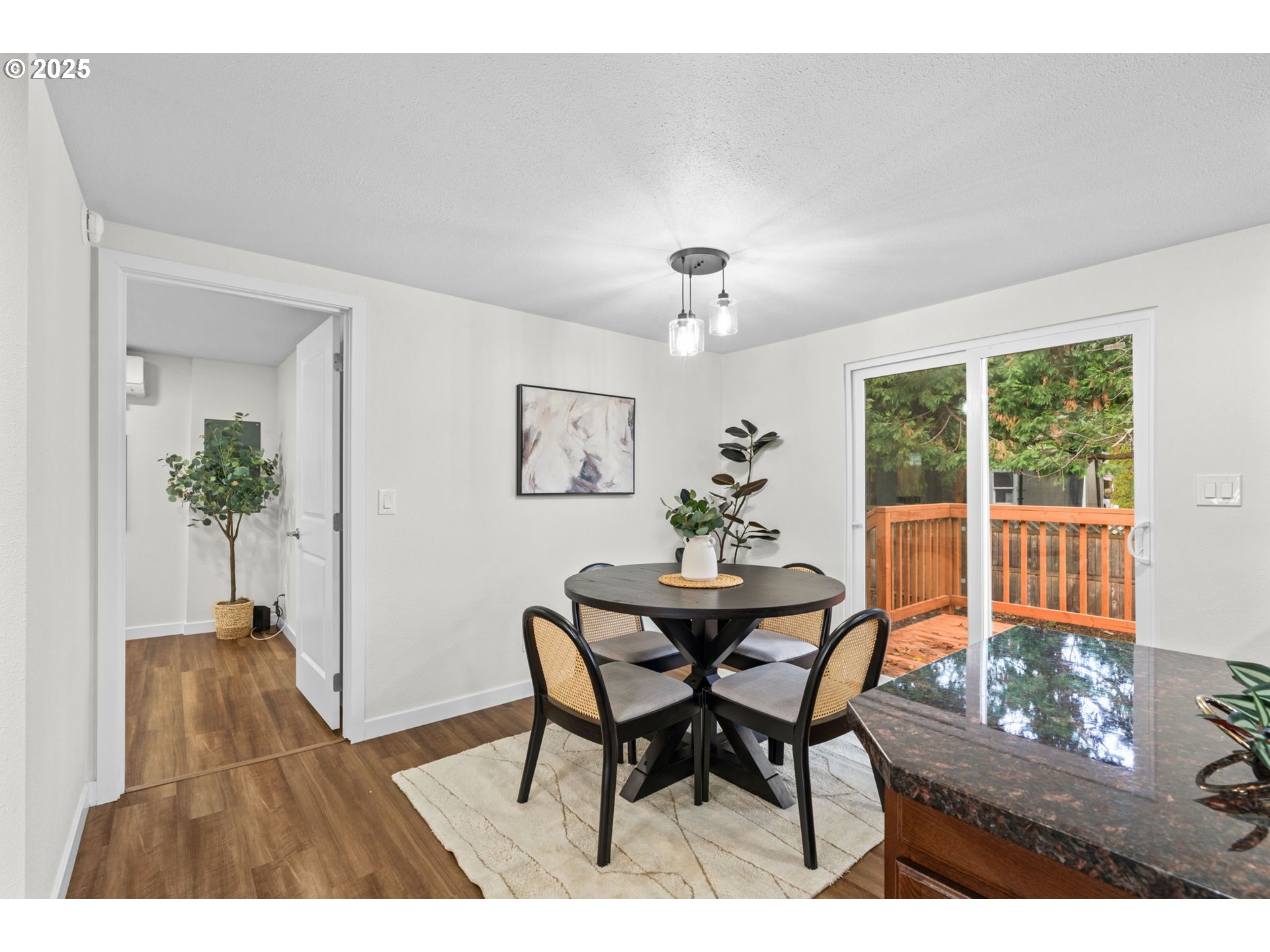 27645 Snyder Road Junction City, OR 97448 - Photo 14 of 41 a view of a dining room with furniture and chandelier